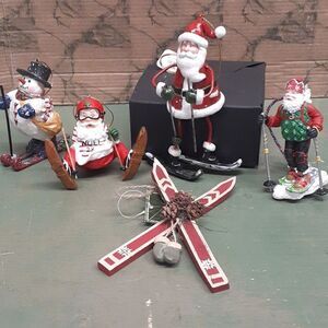 Skiing Santa's, Snowmen, & moose